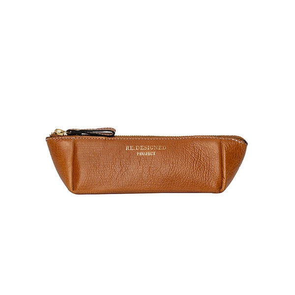 ReDesigned PROJECT 11 is a small triangular leather Tool Case for knitting needles or crochet hooks. Burned tan