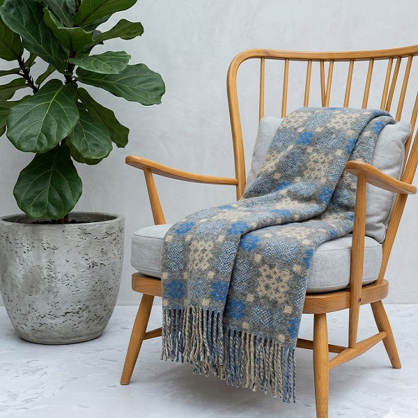 Welsh blanket named Dunraven on a wooden chair