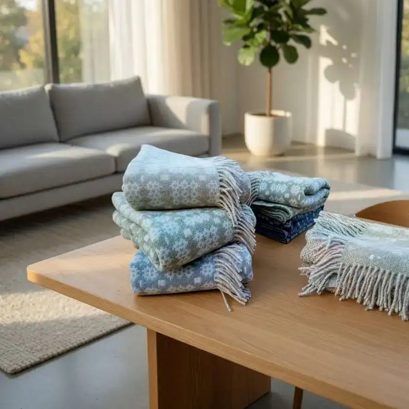 Welsh blankets in Summer colours in a modern living room