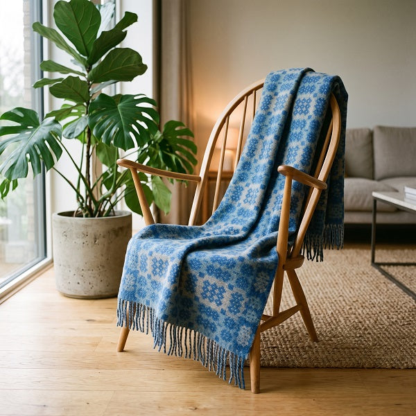 St David's Welsh blanket. Draped over a wooden chair in a modern living room