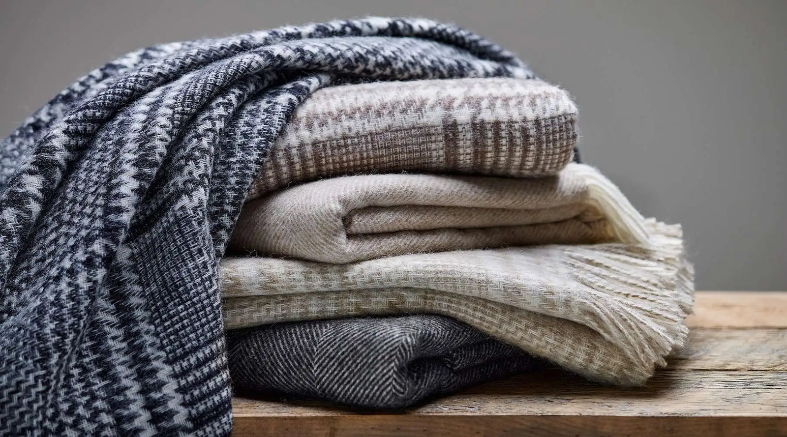 Bronte by Moon Blankets and Throws.  Discover the timeless quality, beautifully woven in Yorkshire, England by one of Britain's last remaining vertical wool mills
