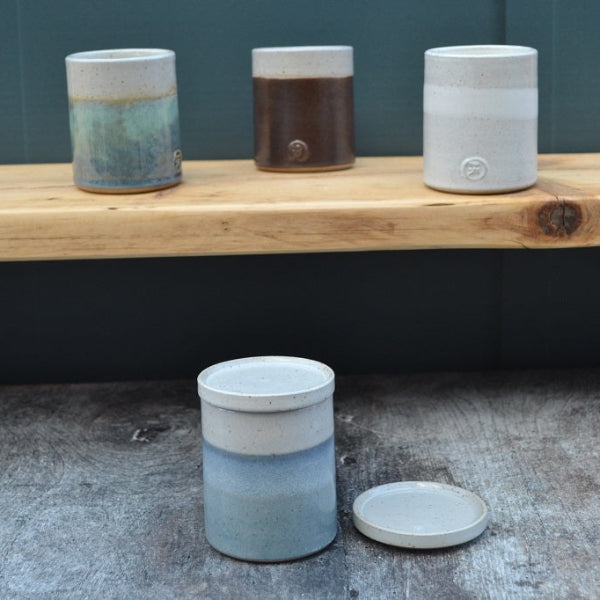 Stoneware Candle with a lid in hand thrown and glazed in Sky Blue. Other colour candles in this Collection