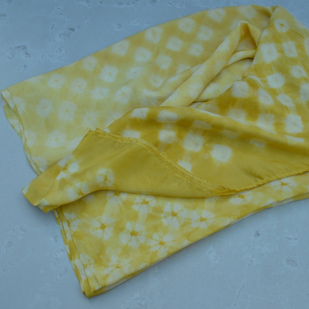 Hand dyed scarves, dyed with natural dyes. A silk shawl in a dot design that has been hand-tied by skilled Bandhani artisans of India 5