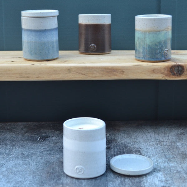 Stoneware Candle with a lid in hand thrown and glazed in Mist. Other colour candles in this Collection