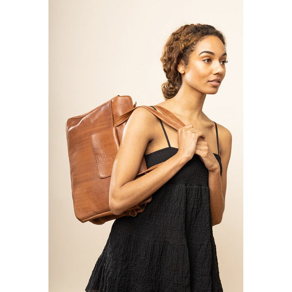 ReDesigned Evia Bag. Indulge in the timeless elegance of the Evia Urban Bag, featuring a deluxe padded laptop compartment. Handcrafted in premium leather 5