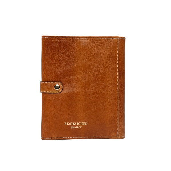 ReDesigned PROJECT 14 is an XL needle case for organising interchangeable circular knitting needles. Burned tan