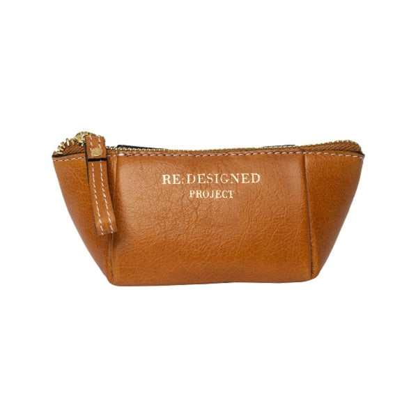 ReDesigned PROJECT 35 is a small case for scissors, stitch markers, needles, wire stoppers and other small items. Burned tan