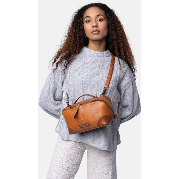 Redesigned 78 bag with cross body strap. Double zip, two spacious compartments. 