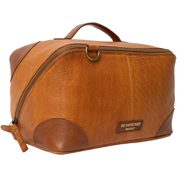 Redesigned 79 bag with cross body strap. Double zip, two spacious compartments and a removable zipped pocket inside.  Burned Tan  