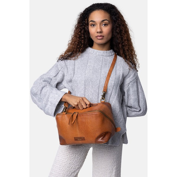 Redesigned 79 bag with cross body strap. Double zip, two spacious compartments and a removable zipped pocket inside.