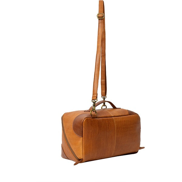 Redesigned 79 bag with cross body strap. Double zip, two spacious compartments and a removable zipped pocket inside. Burned Tan 