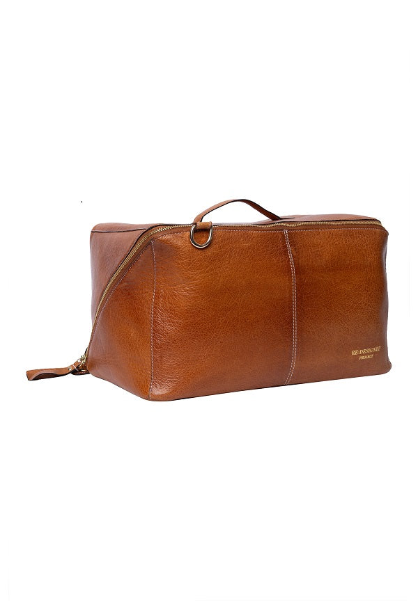 Redesigned Project 90 knitting bag, handcrafted in premium leather. Large for a sweater or jumper project - Burned tan, side view