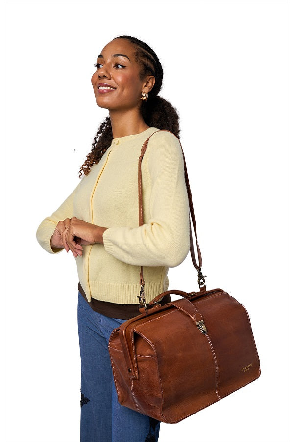 Redesigned project 98 - walnut modelled with the strap