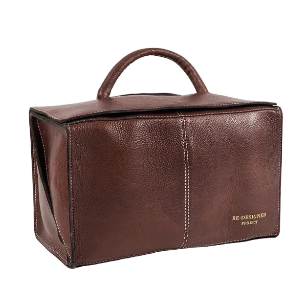 Project 115, a handcrafted leather knitting accessory bag designed to keep multiple knitting projects neatly organised in style, at home or on the go. Walnut