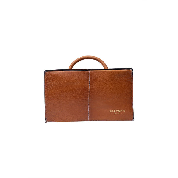 Project 115, a handcrafted leather knitting accessory bag designed to keep multiple knitting projects neatly organised in style, at home or on the go. 
