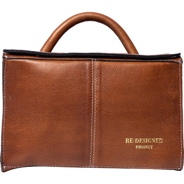 Project 134, a handcrafted leather knitting accessory bag designed to keep your yarn and tools neatly organised in style, at home or on the go. 