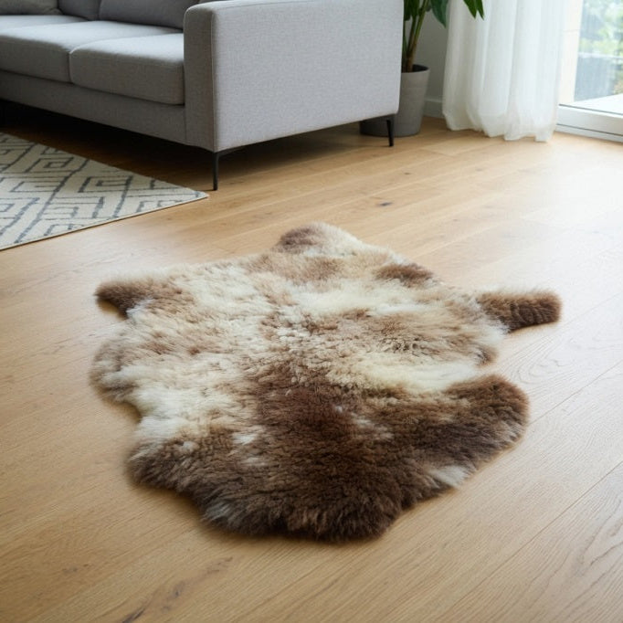 Sheepskin two tone tug on light oak floor