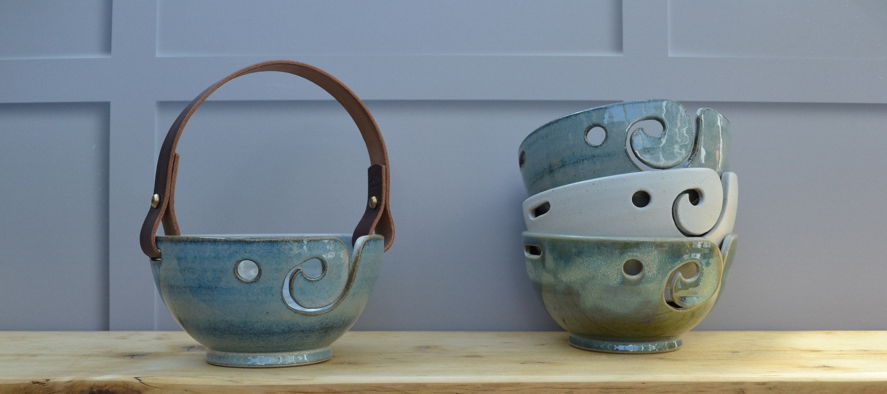 Unique handmade yarn bowls with our distinctive and much-loved leather handles in a variety of designs and colours