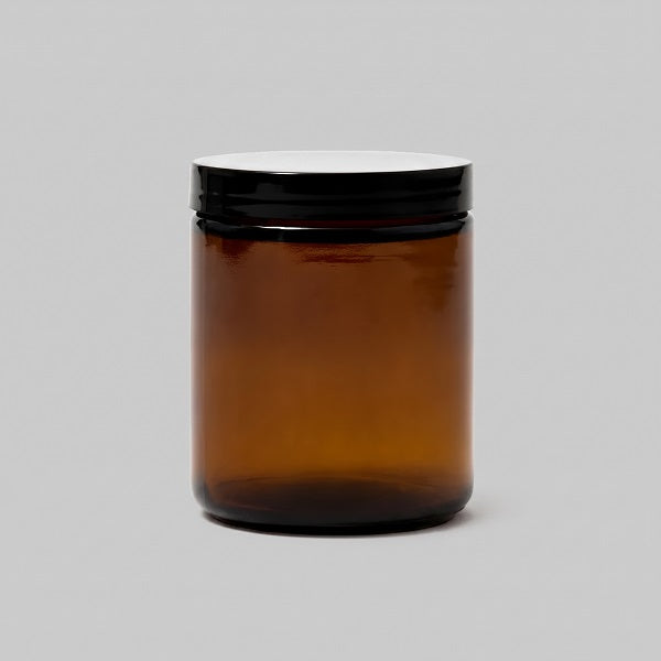TirGlas Candles - An amber, apothecary style 20 cl glass jar with a black screw-on lid. Hand poured soy wax candles.