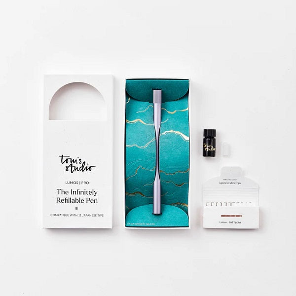 Tom's Studio - Lumos Pro Single - The Infinitely Refillable Pen Lilac in its packing box