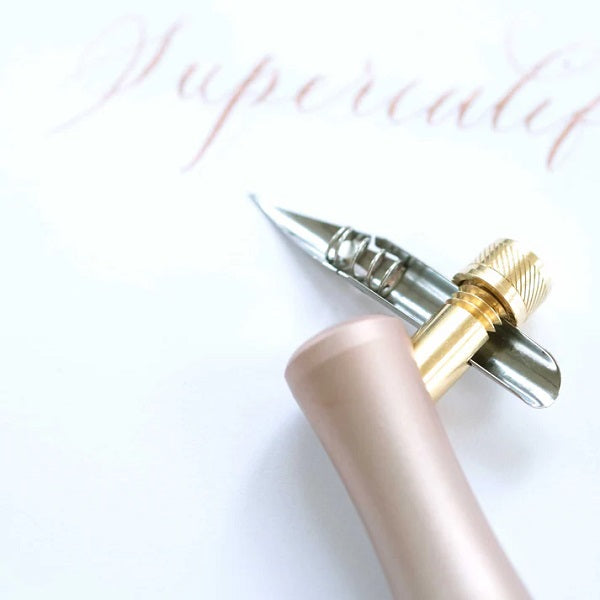 Toms Studio - The 'One Dip Wonder' for calligraphy pens in use