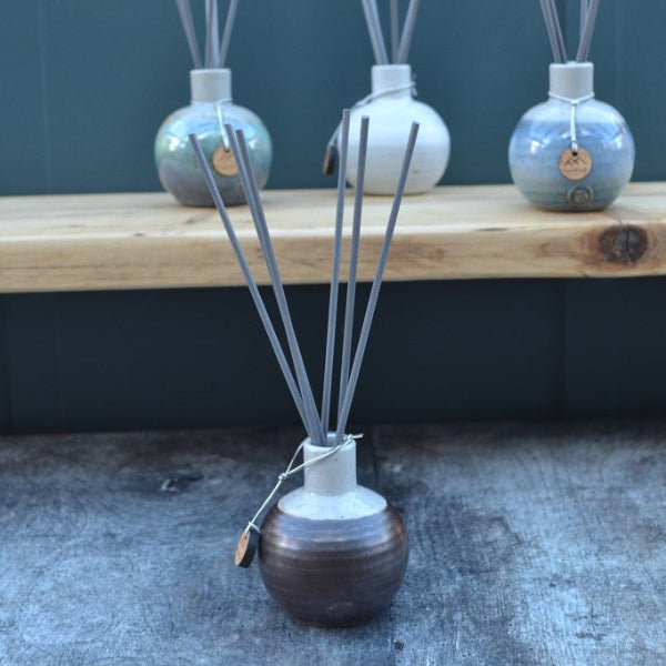 Stoneware reed diffusers, hand thrown and glazed in Walnut. Available in other diffuser colours