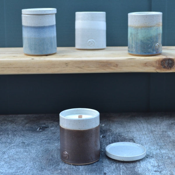 Stoneware Candle with a lid in hand thrown and glazed in Walnut. Other colour candles in this Collection