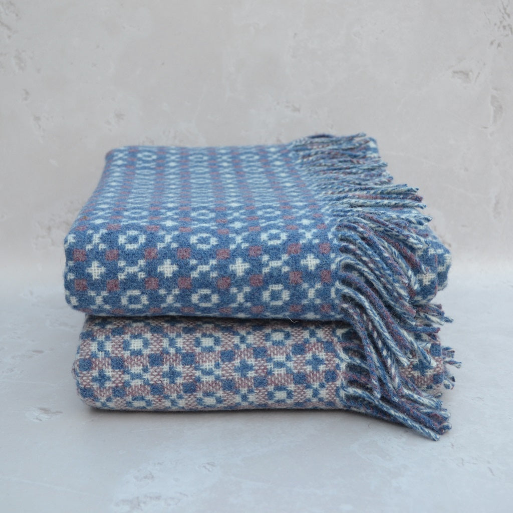 TirGlas Welsh Blankets - Pen y Fan. In Cornflower Blue with spot patterns in white and pink.