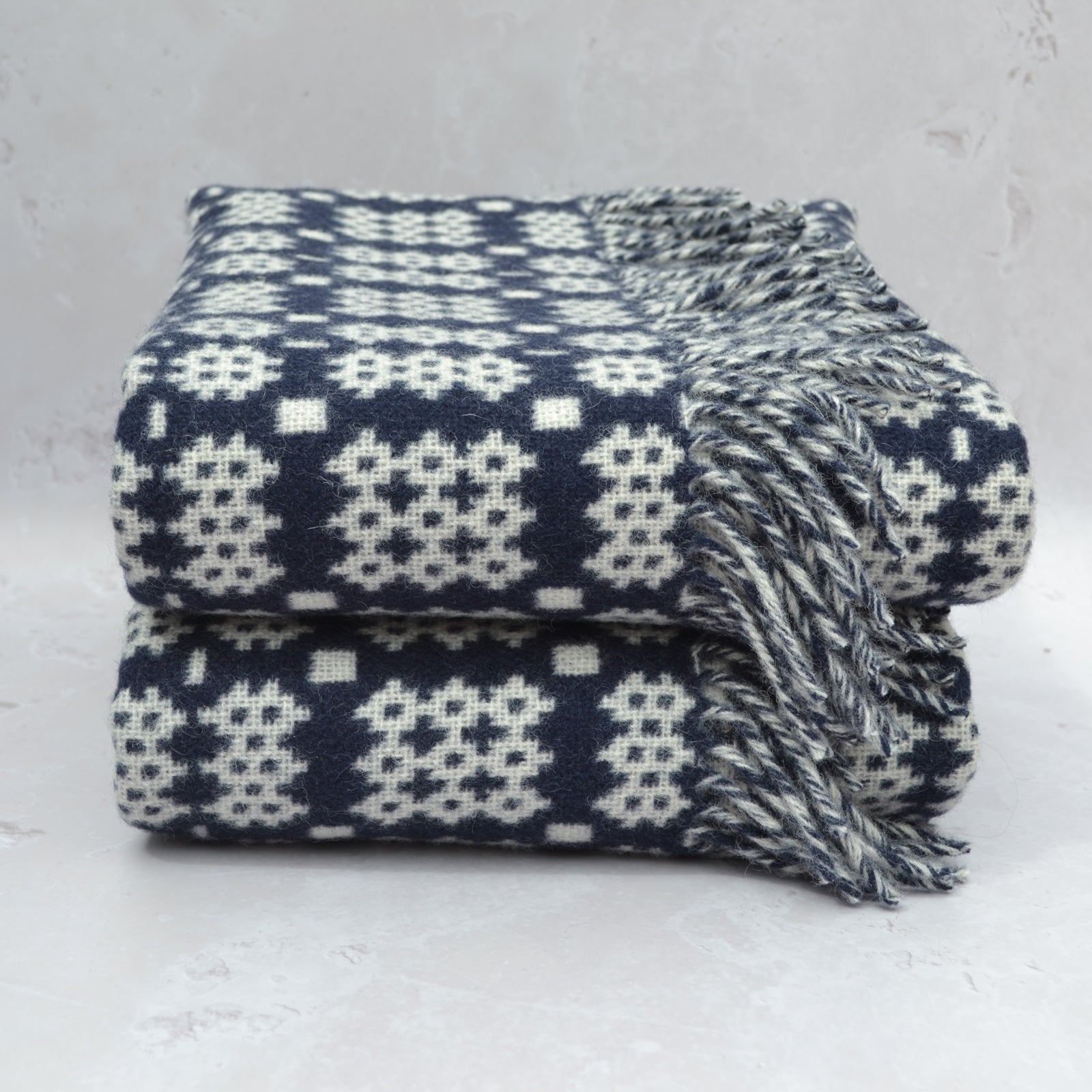 TirGlas Welsh Blankets - Bodnant in navy and cream in the Caernarfon portcullis patterns