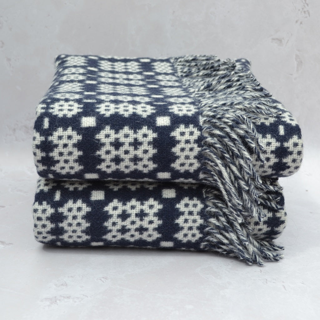 Welsh blanket. This tapestry style blanket is the perfect blend of tradition, quality, and modern style for any room in your home. Double cloth weaving produces a fully reversible blanket