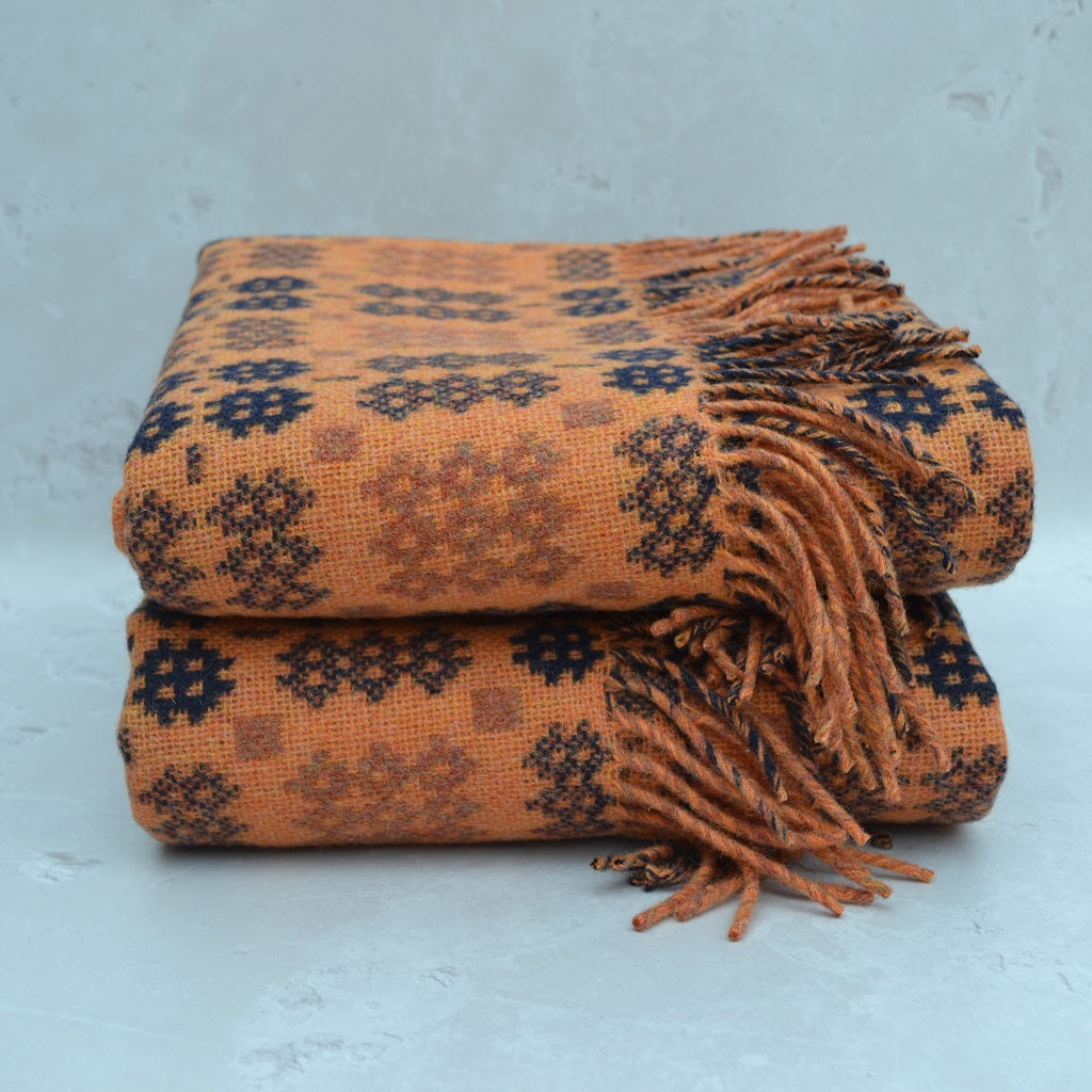 TirGlas Welsh blanket - Pierhead.  This tapestry blanket is the perfect blend of tradition, quality, and modern style for any room in your home. Its double cloth weave makes it fully reversible.