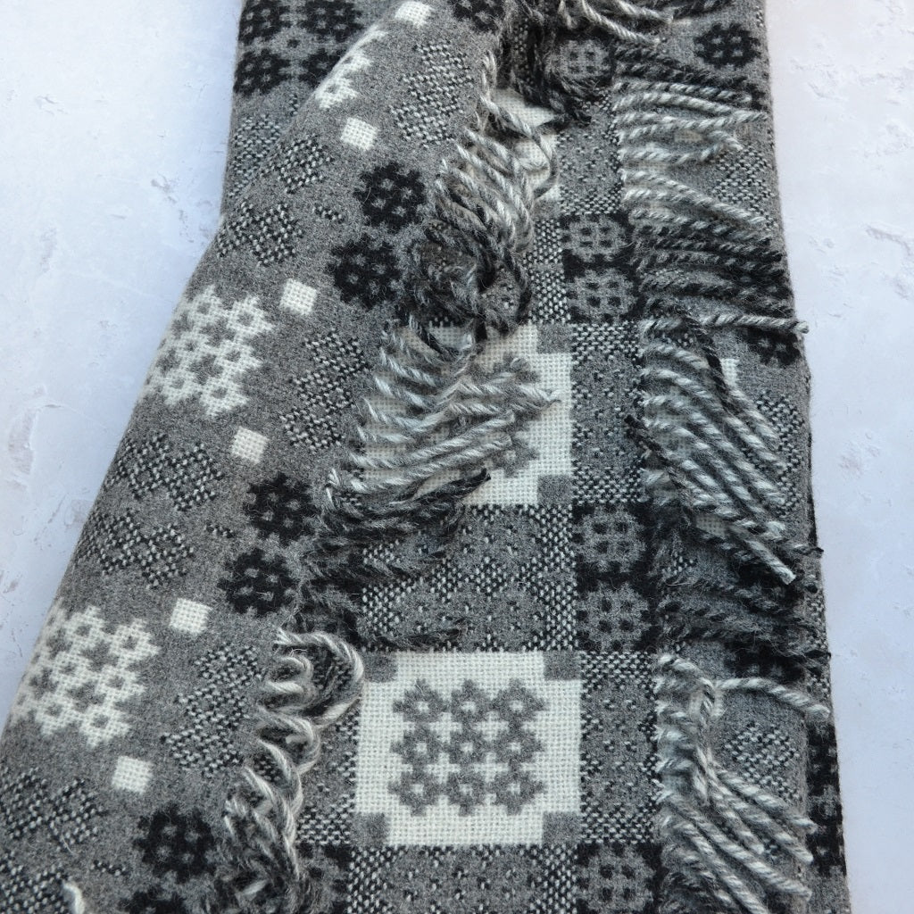 TirGlas Welsh blanket - Senedd. 100% Pure New British Wool: Experience unparalleled softness, warmth, and natural breathability.