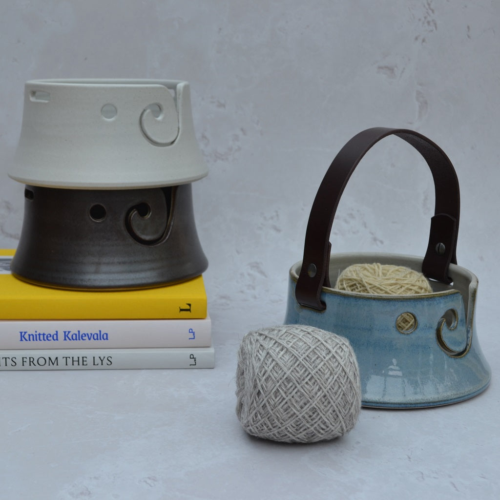 Unique flared-based yarn bowls with distinctive and much-loved leather handles in our Stoneware Pottery range. Sky Blue.